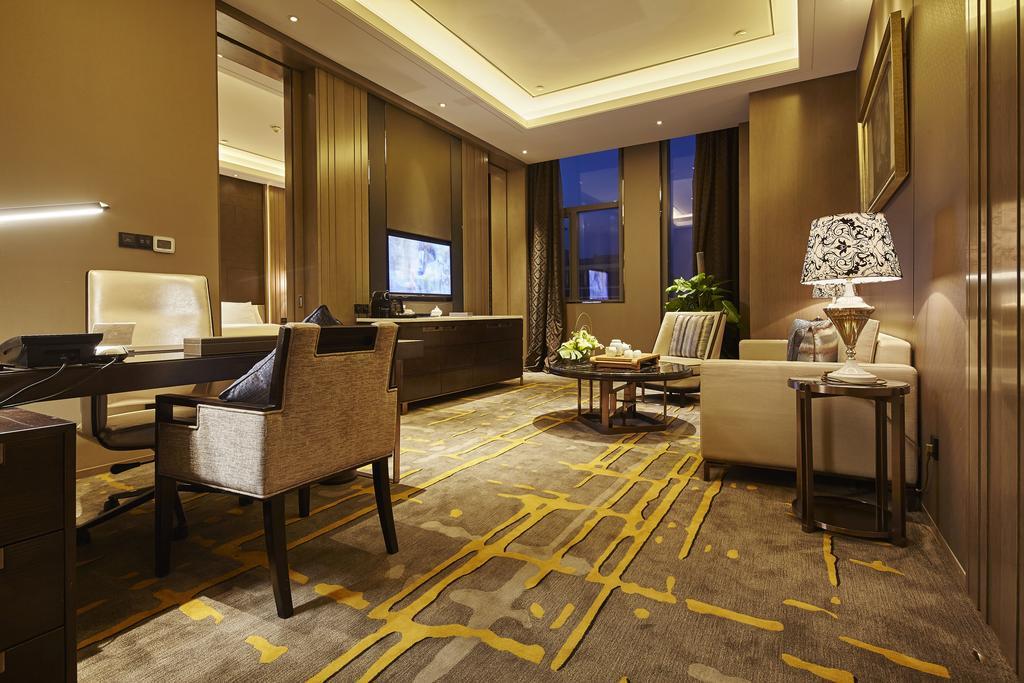Wanda Realm Hotel Dongying Quarto foto